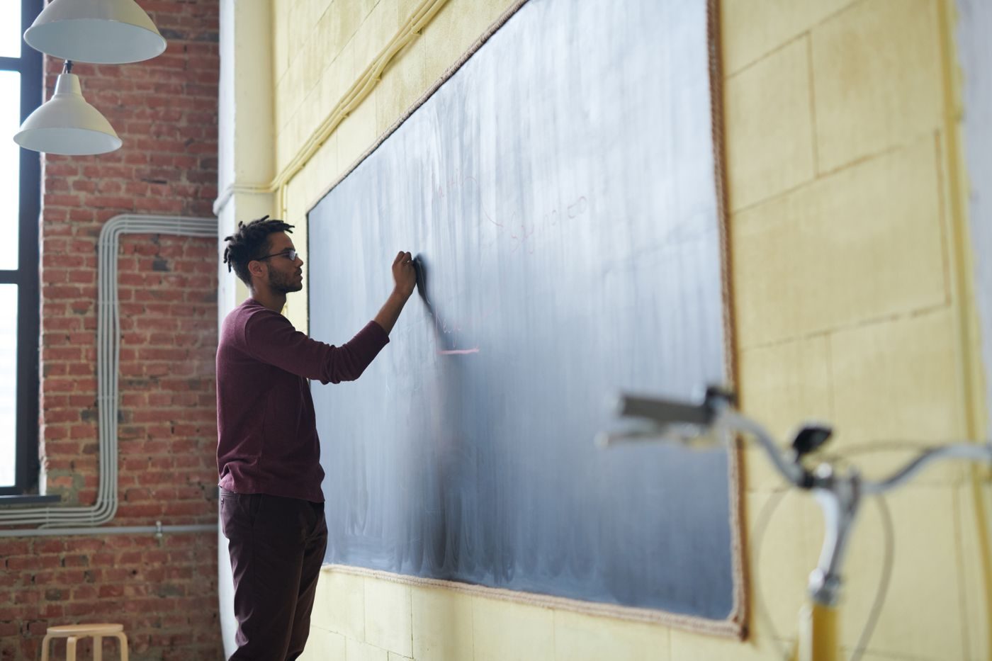 Graduate business learner reviewing management notes